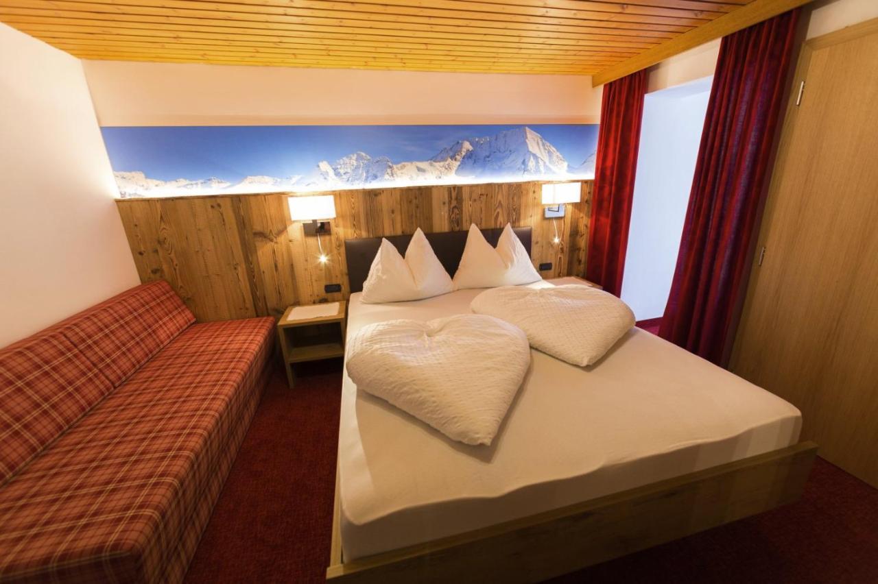 Dreibettzimmer mit Balkon