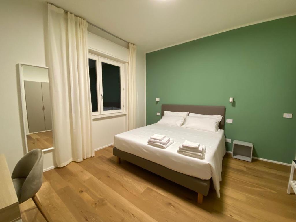 Camera Matrimoniale Deluxe (2 Adulti + 1 Bambino)