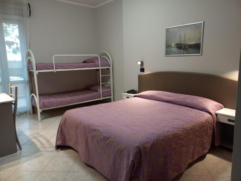 Standard Triple Room with Balcony and Beach access