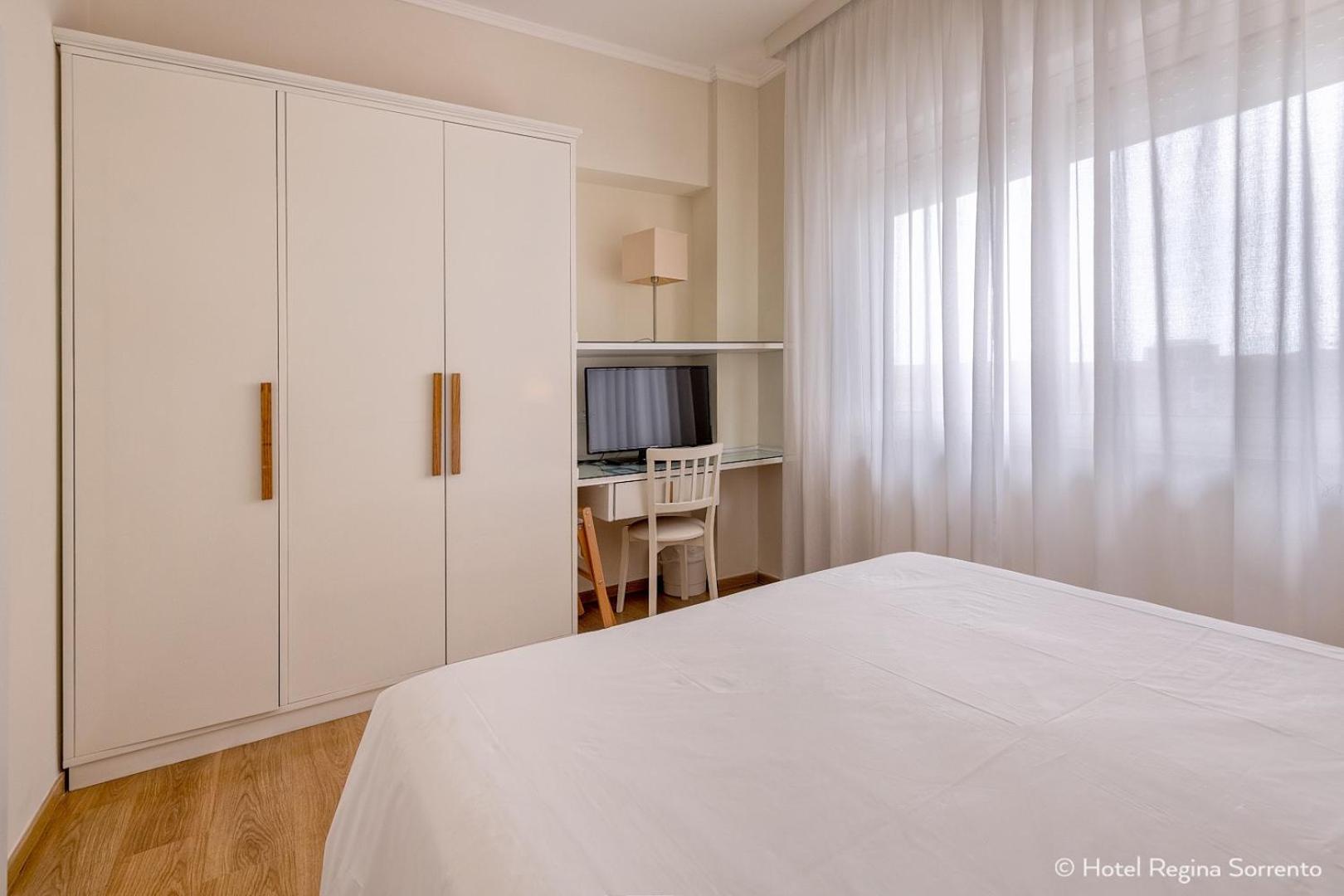 Quarto Quádruplo com Jardim Privado
