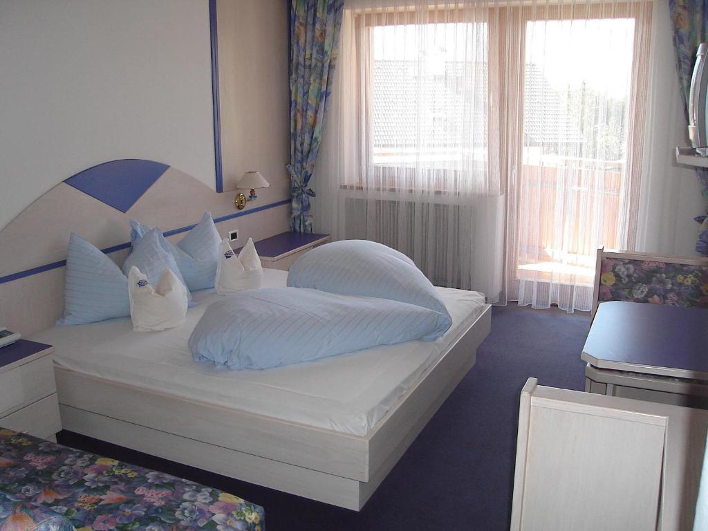 Doppelzimmer mit Balkon und Bergblick
