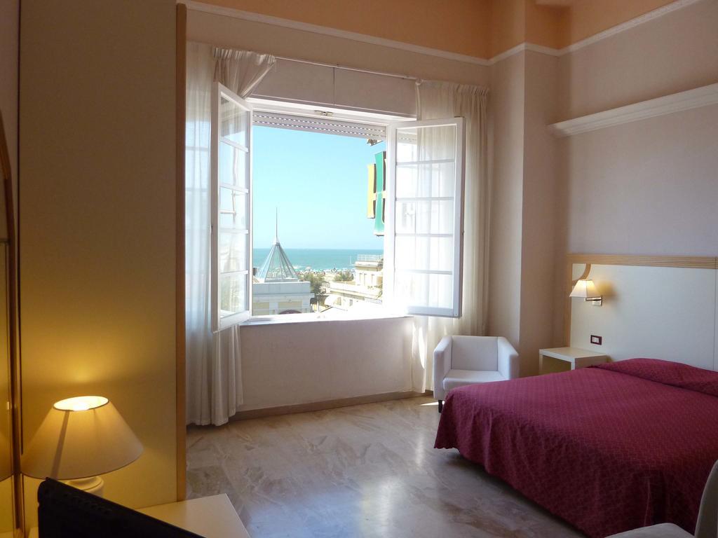 Quarto Quádruplo com Vista Mar