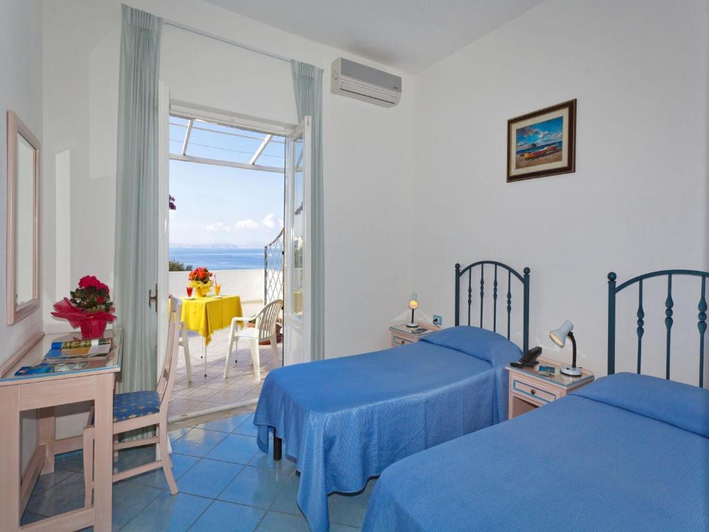 Doppel-/Zweibettzimmer mit Meerblick
