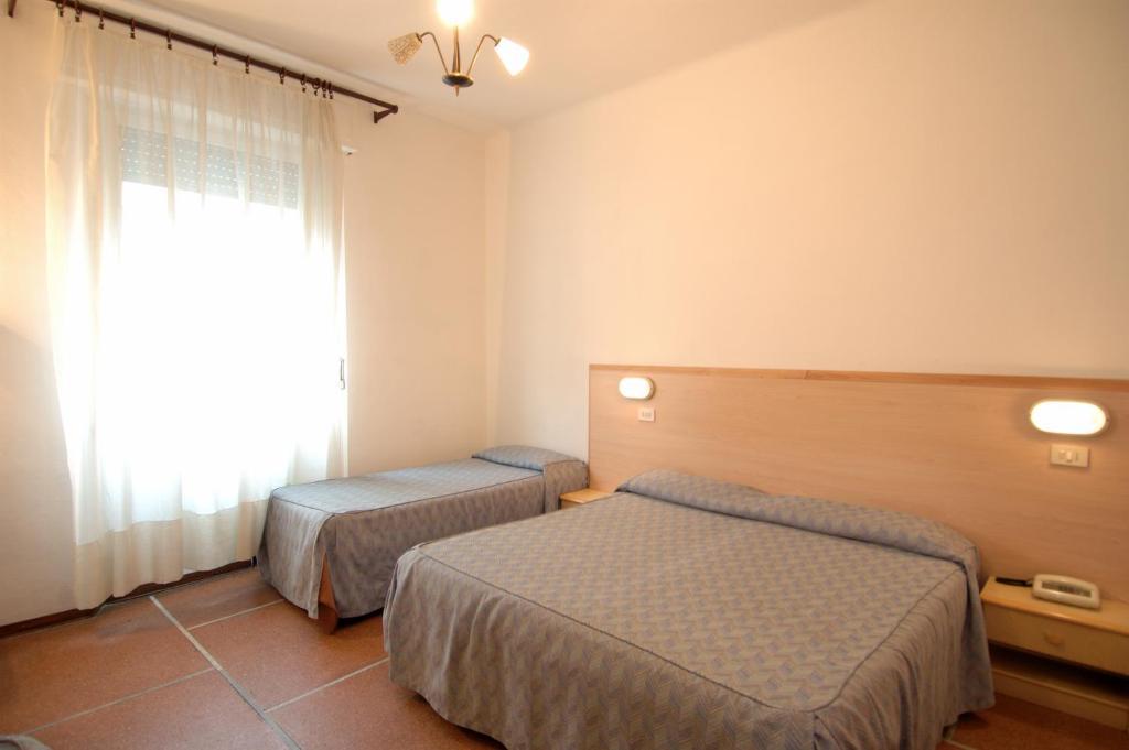 Camera Tripla con Bagno in Comune