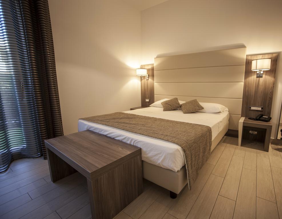 Doppel- oder Zweibettzimmer mit Gartenblick - Erdgeschoss - Zugang zum Strand
