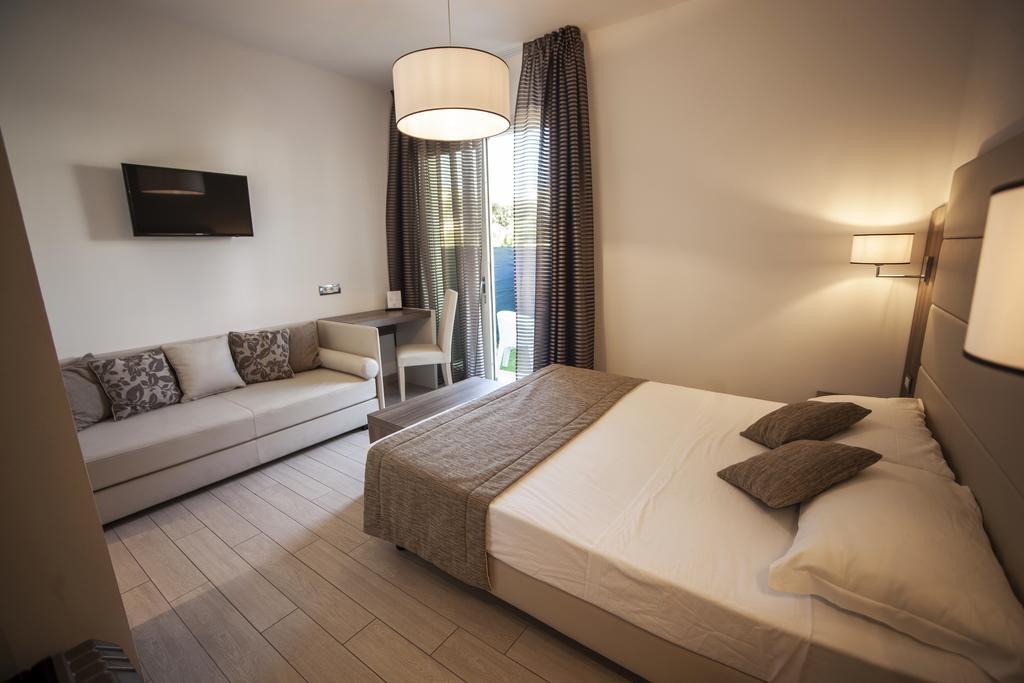Dreibettzimmer mit Gartenblick - Erdgeschoss - Zugang zum Strand