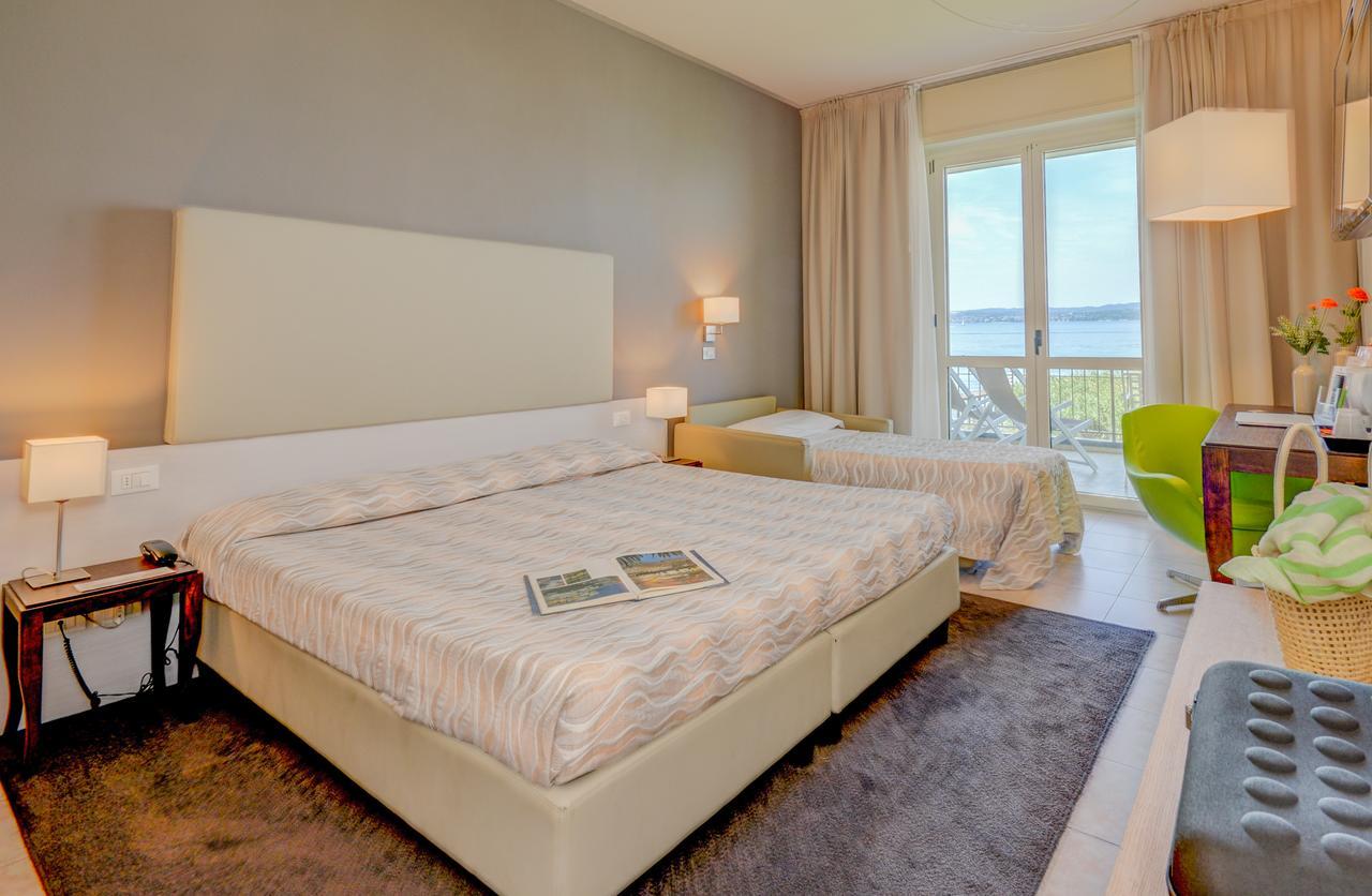 Deluxe Dreibettzimmer mit Seeblick